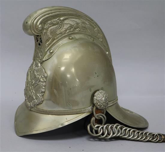 A firemans helmet and a leather belt